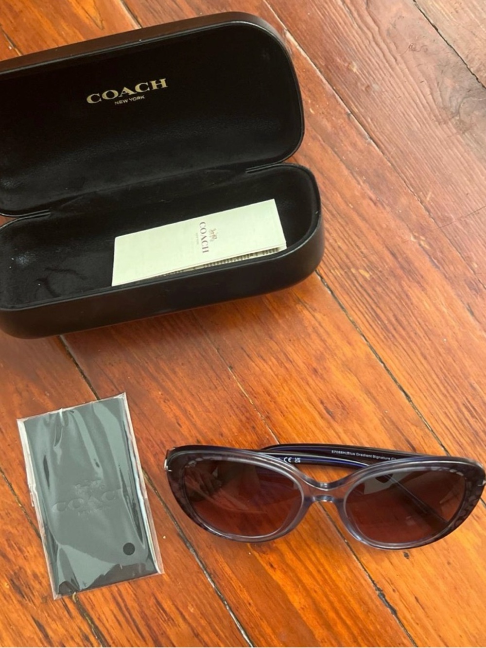 COACH Cat Eye Sunglasses in Translucent Gray with Brown Lenses
